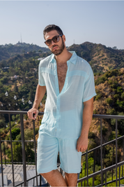 Camisa playera de manga corta con botones y ribete plisado para hombre
