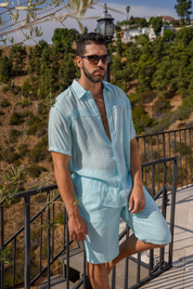 Camisa playera de manga corta con botones y ribete plisado para hombre