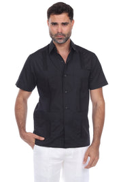 Front view of a black short sleeve guayabera shirt for men featuring a traditional four-pocket design and polished look.