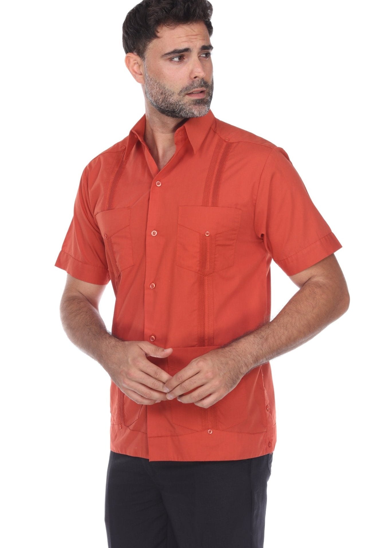 Men's short sleeve guayabera shirt in burnt orange with heritage embroidery and a structured 4-pocket design.