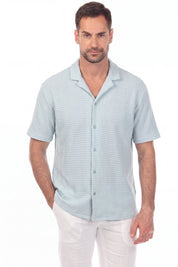 Polo elegante de primera calidad para hombre con moderno patrón de punto trenzado texturizado