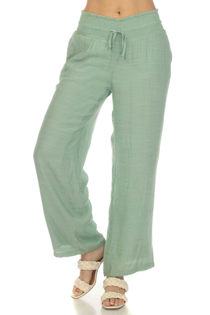 Front view of Ladies Smocked Waist Drawstring Palazzo Pants in white, with smocked waist detail.