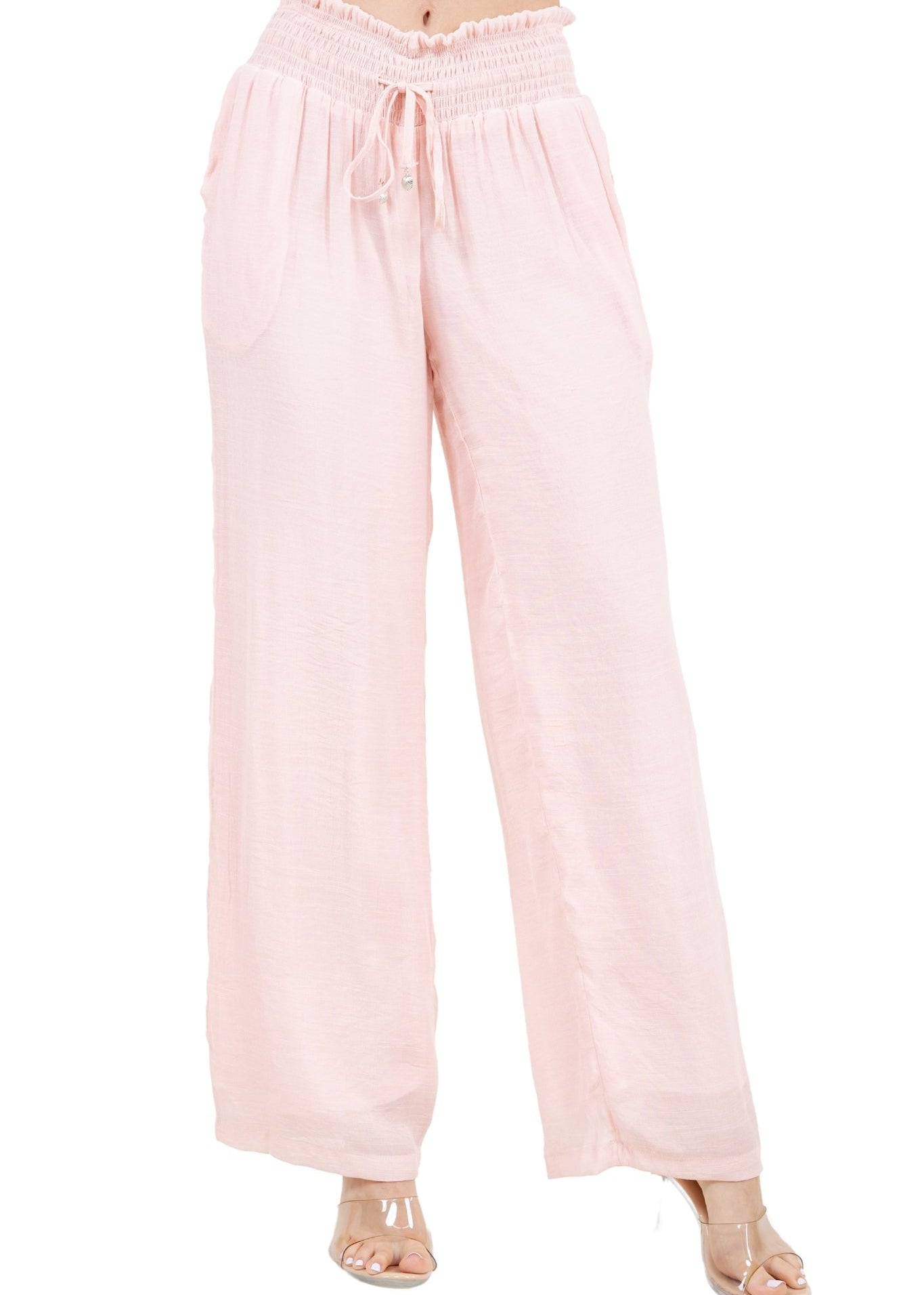 Front view of light pink Ladies Smocked Waist Drawstring Palazzo Pants, showing the smocked waist and wide leg.