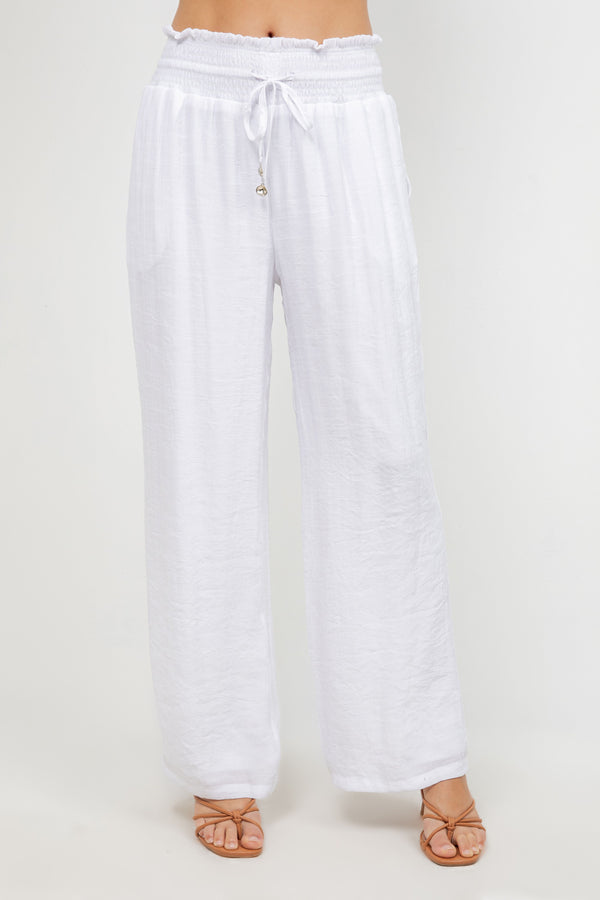 Front view of Ladies Smocked Waist Drawstring Palazzo Pants in white, with smocked waist detail.