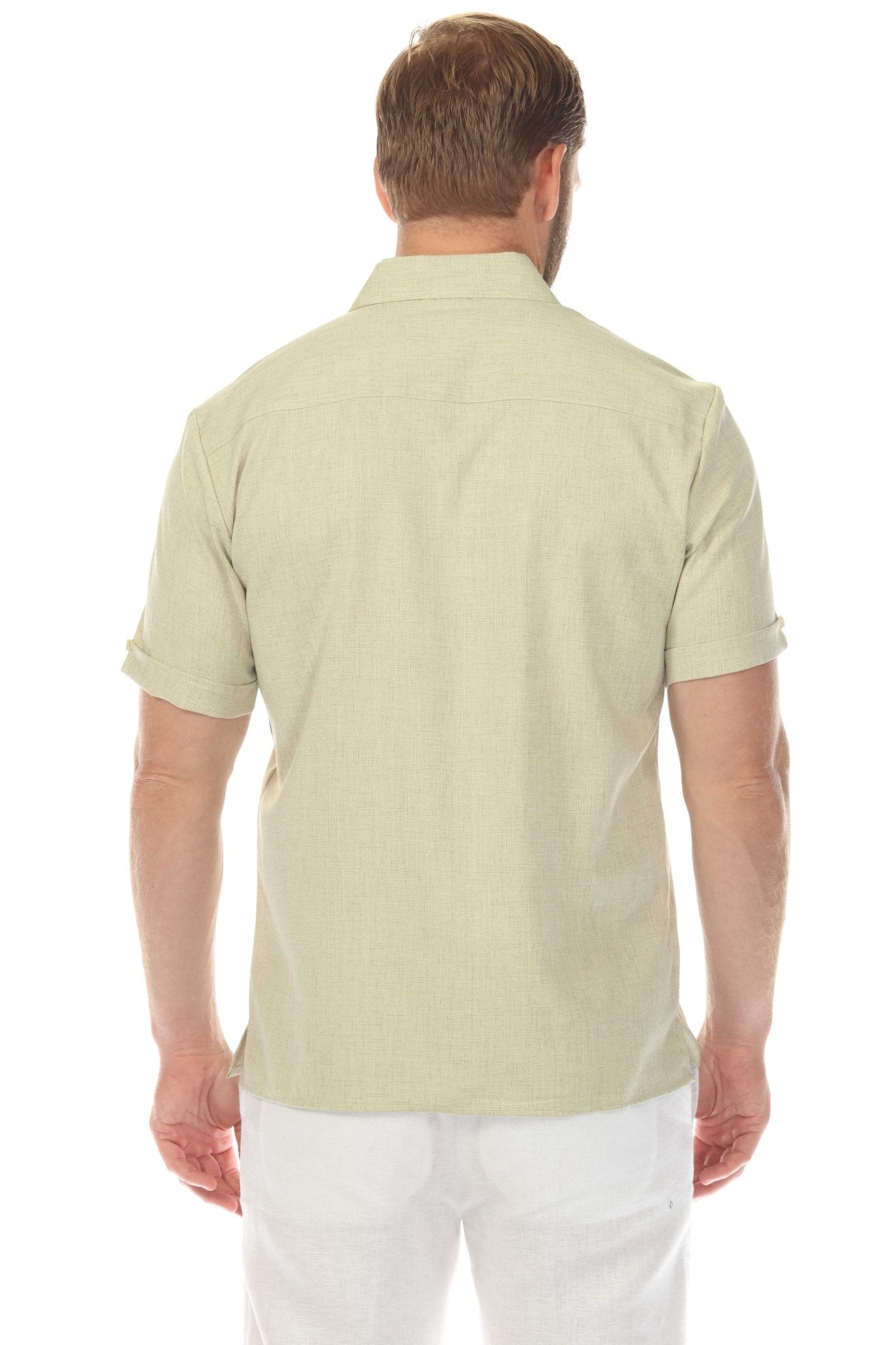 Back view of a man wearing a light green Men’s Classic Two-Pocket Guayamisa Shirt.