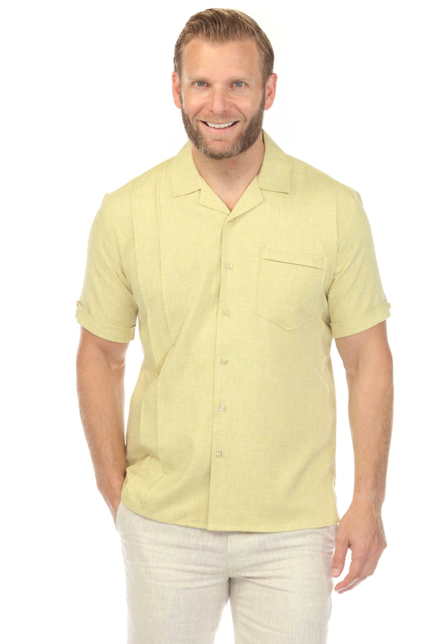 Front view of a man wearing a yellow Menâ€™s Retro Cuban Shirt with pleating and one pocket.