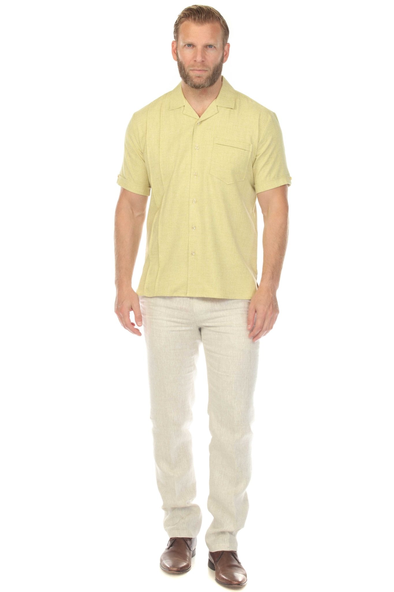 Front view of a man wearing a light-green Menâ€™s Retro Cuban Shirt with Pleating and one pocket.