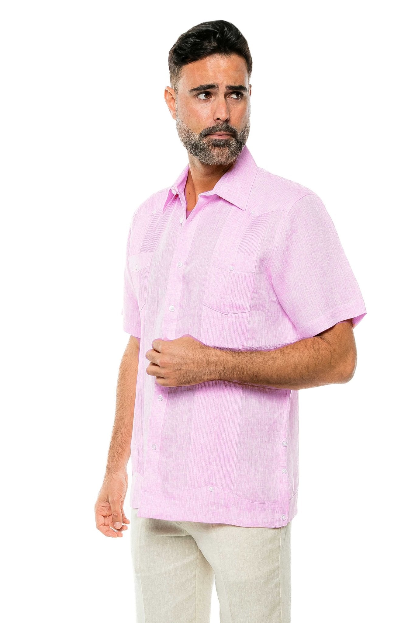 Model wearing the Yarn Dye 100% Linen Two Pocket Guayabera Short Sleeve; light pink color, view showing the two pockets details.