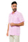 Model wearing the Yarn Dye 100% Linen Two Pocket Guayabera Short Sleeve; light pink color, view showing the two pockets details.