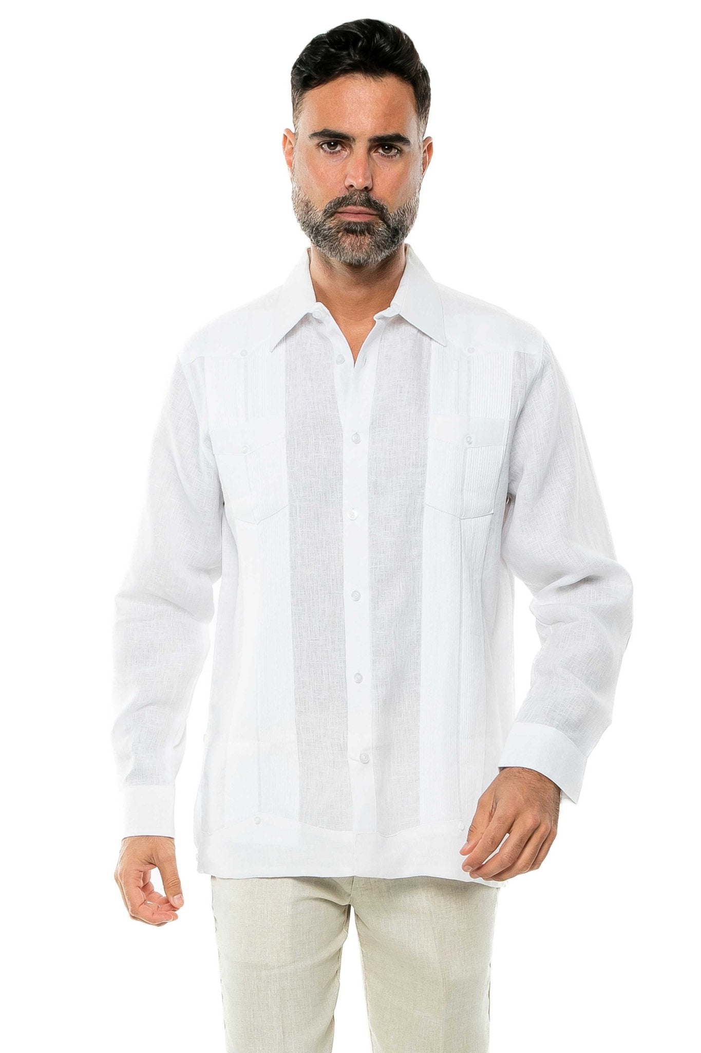 Front view of a man wearing a white 100% Linen Yarn Dyed Two Pocket Guayabera Shirt Long Sleeve.