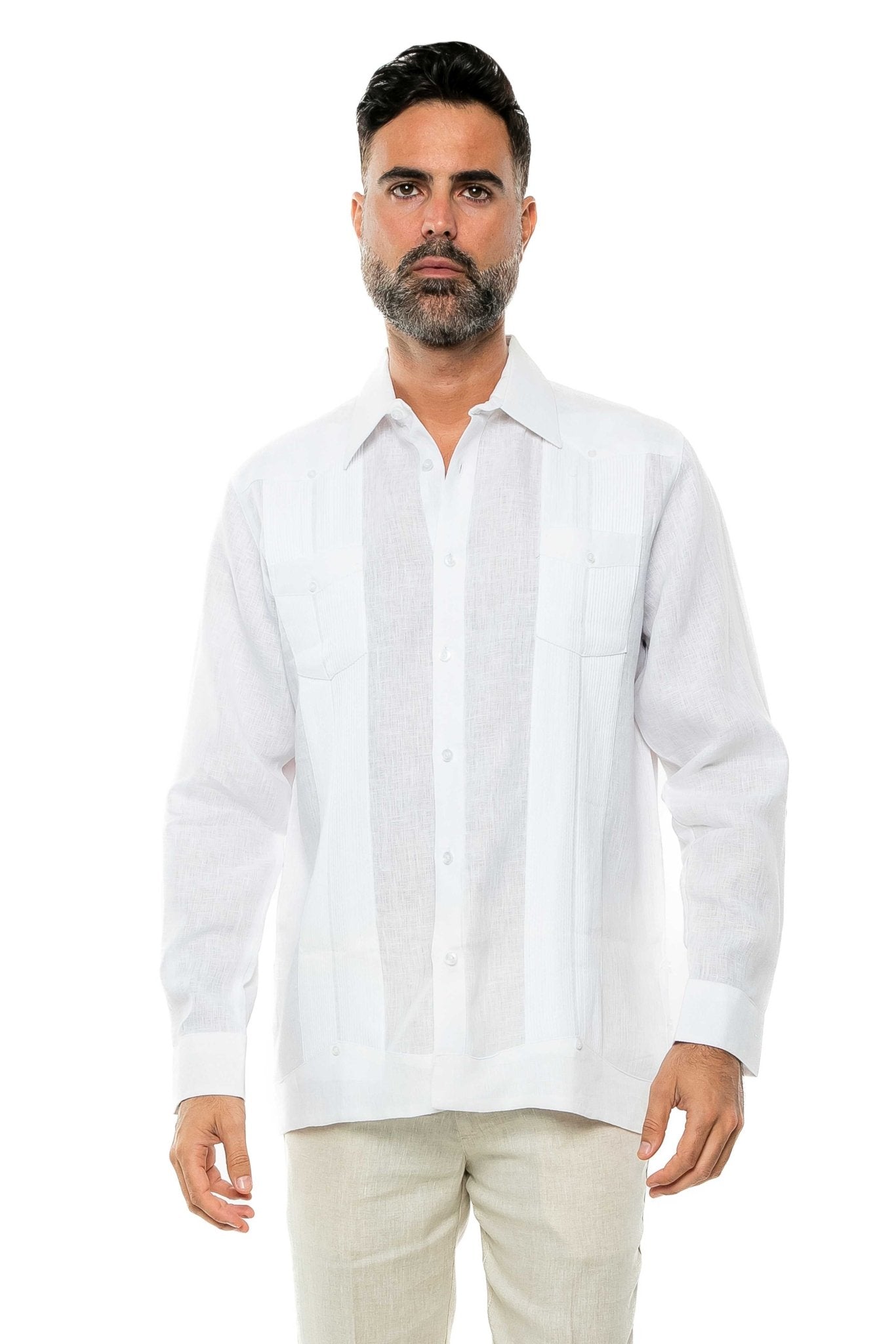 Front view of a man wearing a white 100% Linen Yarn Dyed Two Pocket Guayabera long sleeve shirt.