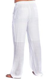 White wide-leg cotton gauze pants with an elastic waistband and side pockets, shown on a model from the back against a white background.