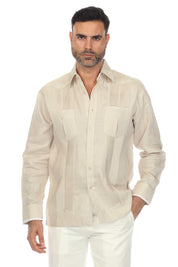 Front view of a man wearing a tan 100% Linen Contrast Panel Guayabera Shirt Long Sleeve and white pants.