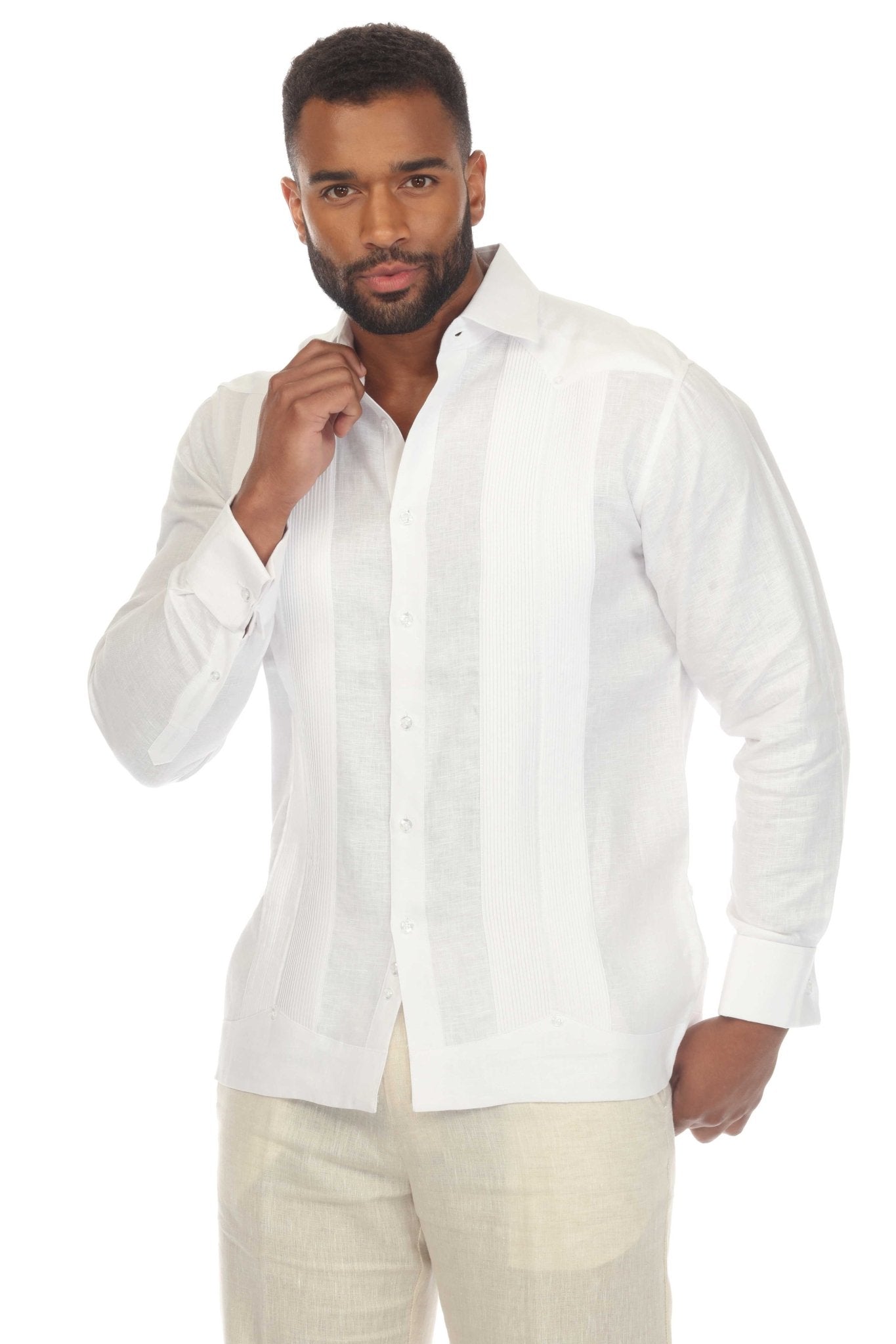 Man wears white 100% Linen Framed Pleat Wedding Guayabera with French Cuffs, unbuttoned at the top.