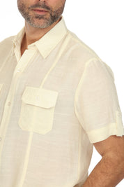 Camisa playera de manga corta con dos bolsillos y botones