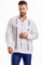 A man models a white, long-sleeved 100% Linen Embroidery Trimmed Guayabera.