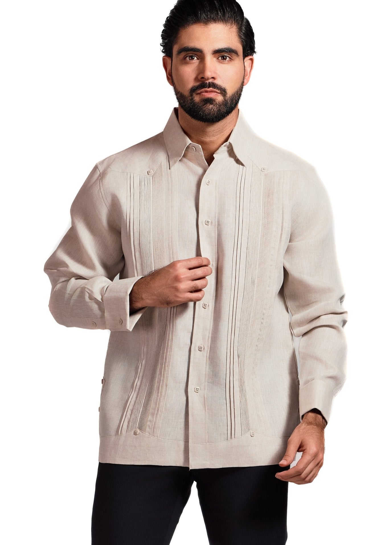 Front view of a man wearing a light tan Men's Linen Formal Guayabera shirt with vertical pleats and French cuffs.