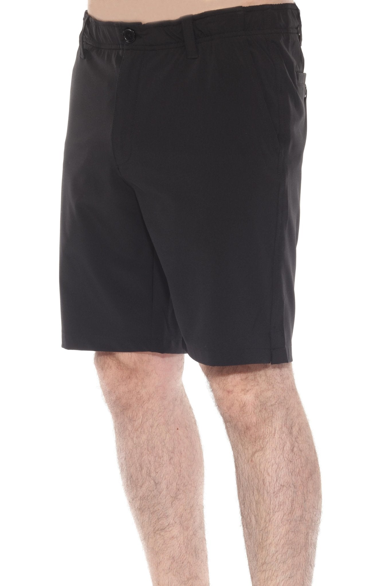 Close up of a person wearing black Men’s Dri-Fit Stretch Performance Shorts, side view showing pockets.