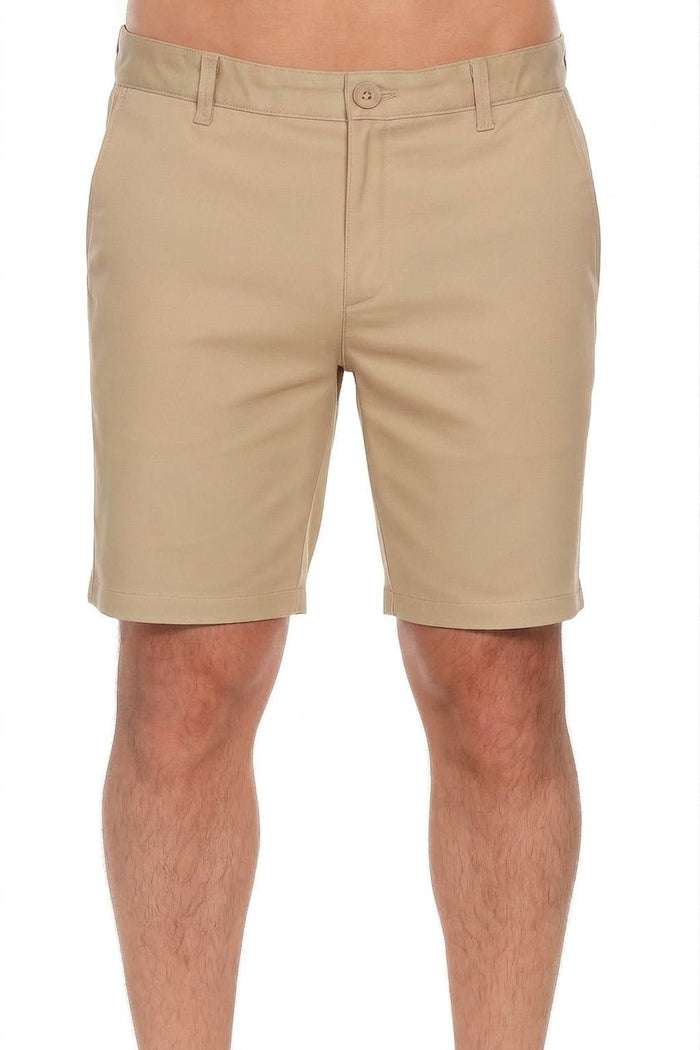 Close up of a model wearing khaki Men’s Dri-Fit Stretch Performance Shorts for Resort &amp; Golf.