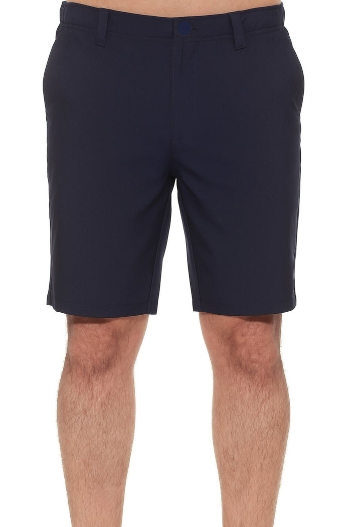 Close up of a model wearing khaki Men’s Dri-Fit Stretch Performance Shorts for Resort &amp; Golf.