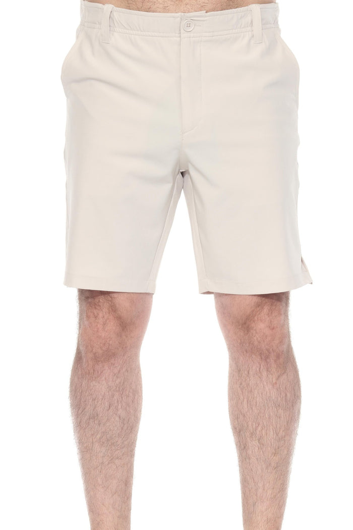 Close up of a model wearing khaki Men’s Dri-Fit Stretch Performance Shorts for Resort &amp; Golf.