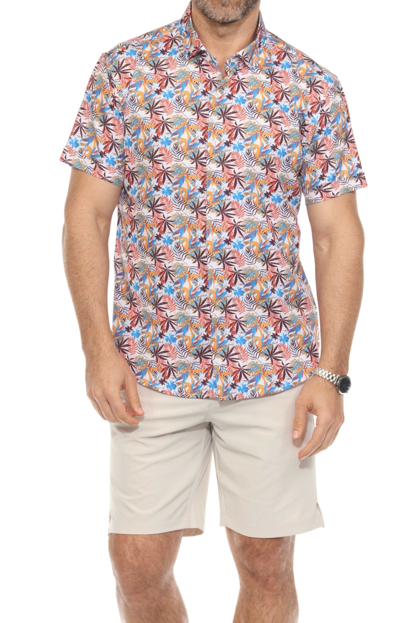 A man wears tan Men’s Dri-Fit Stretch Performance Shorts, front view.