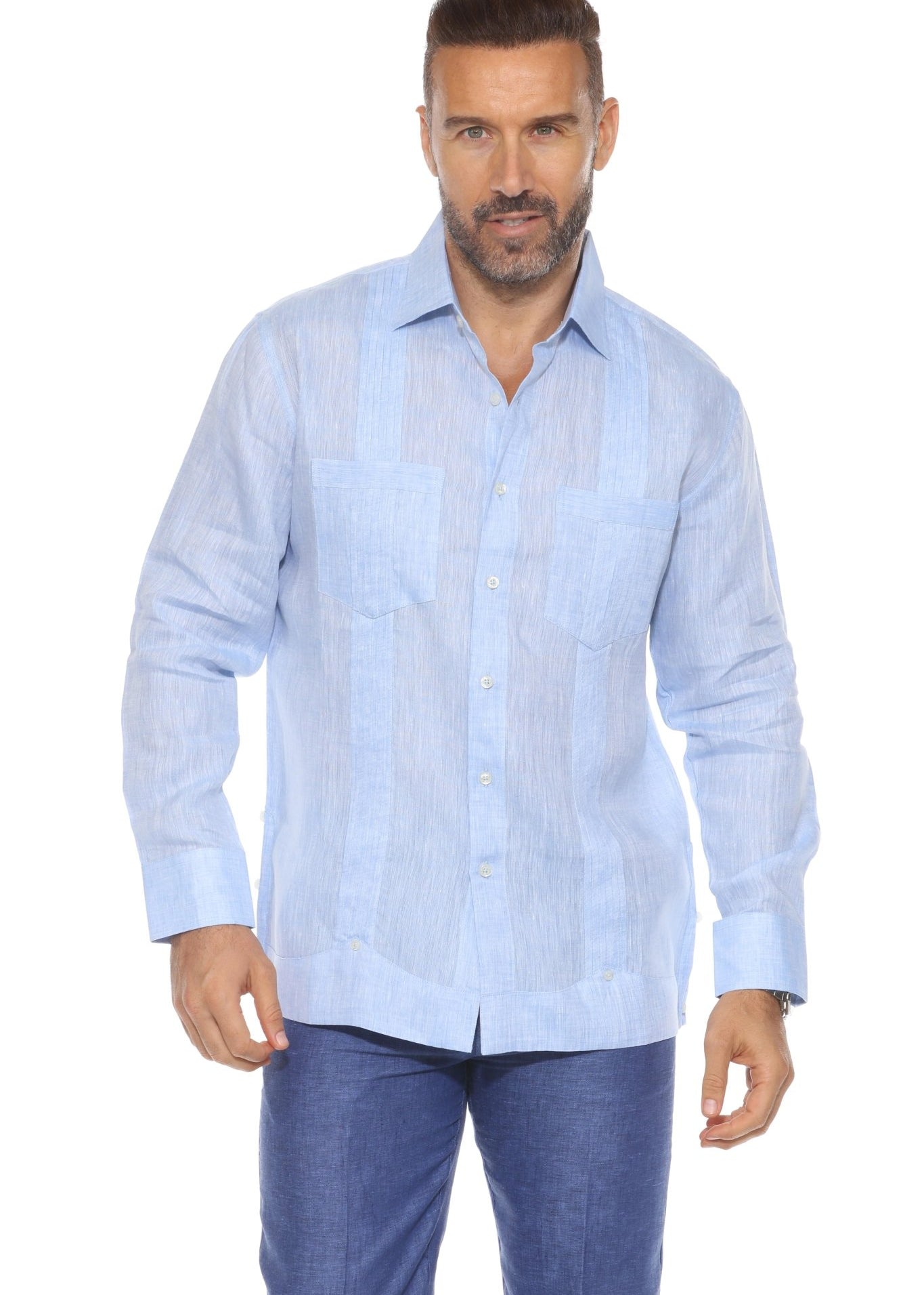 Front view of a man in a light blue, long-sleeved, two-pocket Men's Premium Linen Guayabera Shirt.
