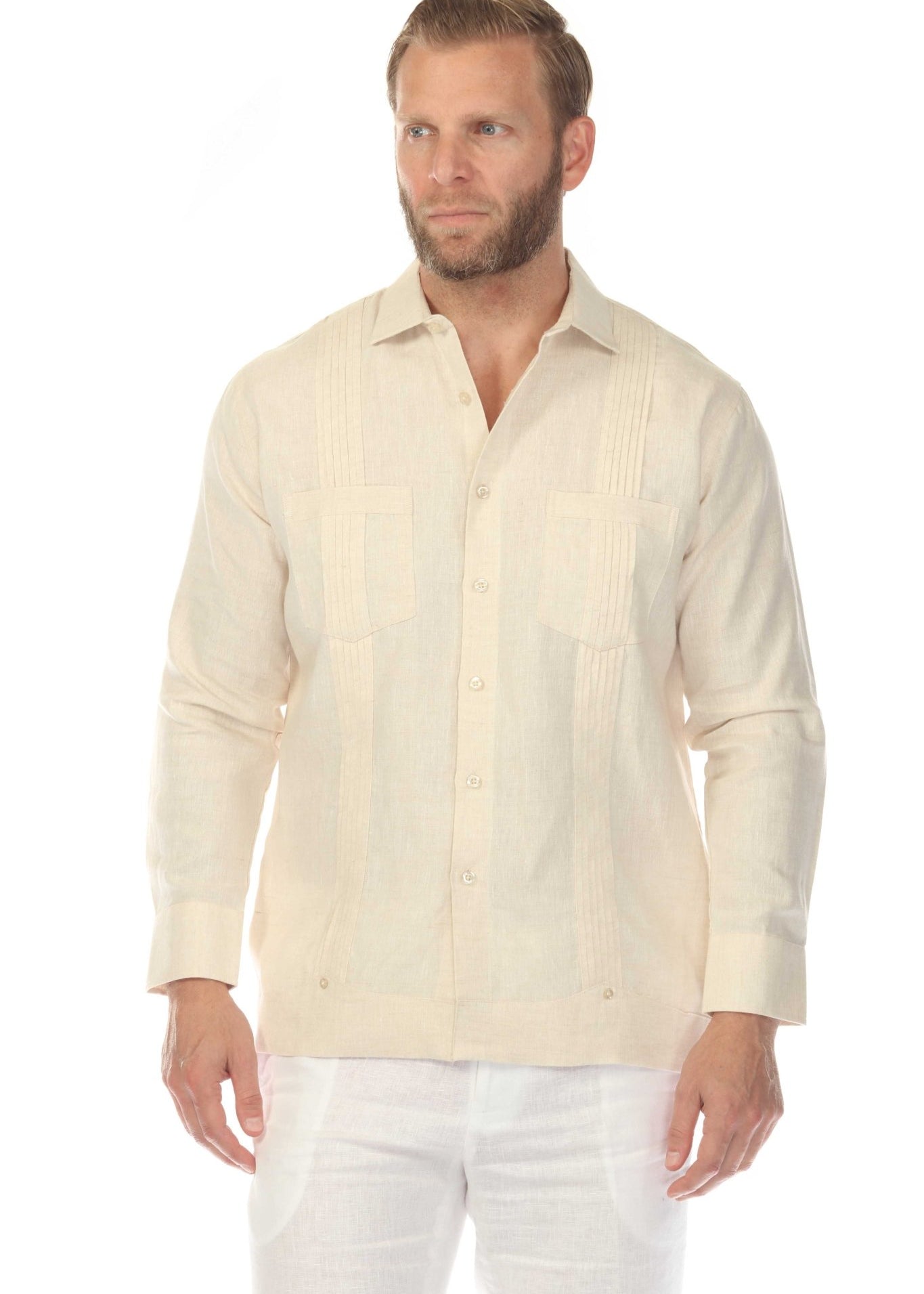 Front view of a man wearing the Men’s Premium Linen Guayabera Shirt in off-white, with long sleeves and two chest pockets.