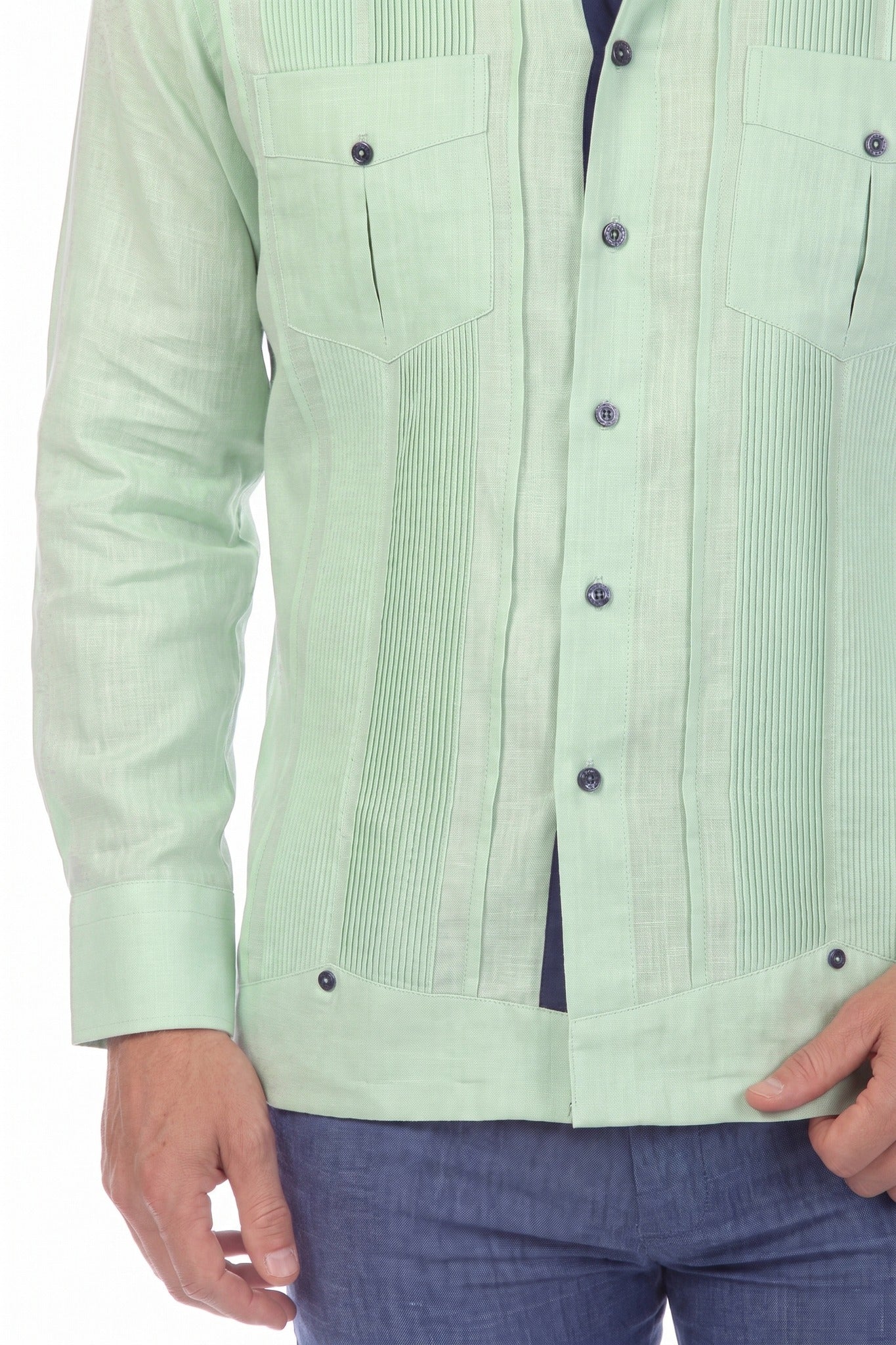 Close-up of the sage green 100% Linen Contrast Panel Guayabera Shirt Long Sleeve, showing pleats and button details.