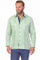 A man wears the sage green 100% Linen Contrast Panel Guayabera Shirt Long Sleeve with navy accents, looking to the side.