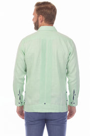 Back view of a man wearing the sage green 100% Linen Contrast Panel Guayabera Shirt Long Sleeve, showing its vertical panel detail.