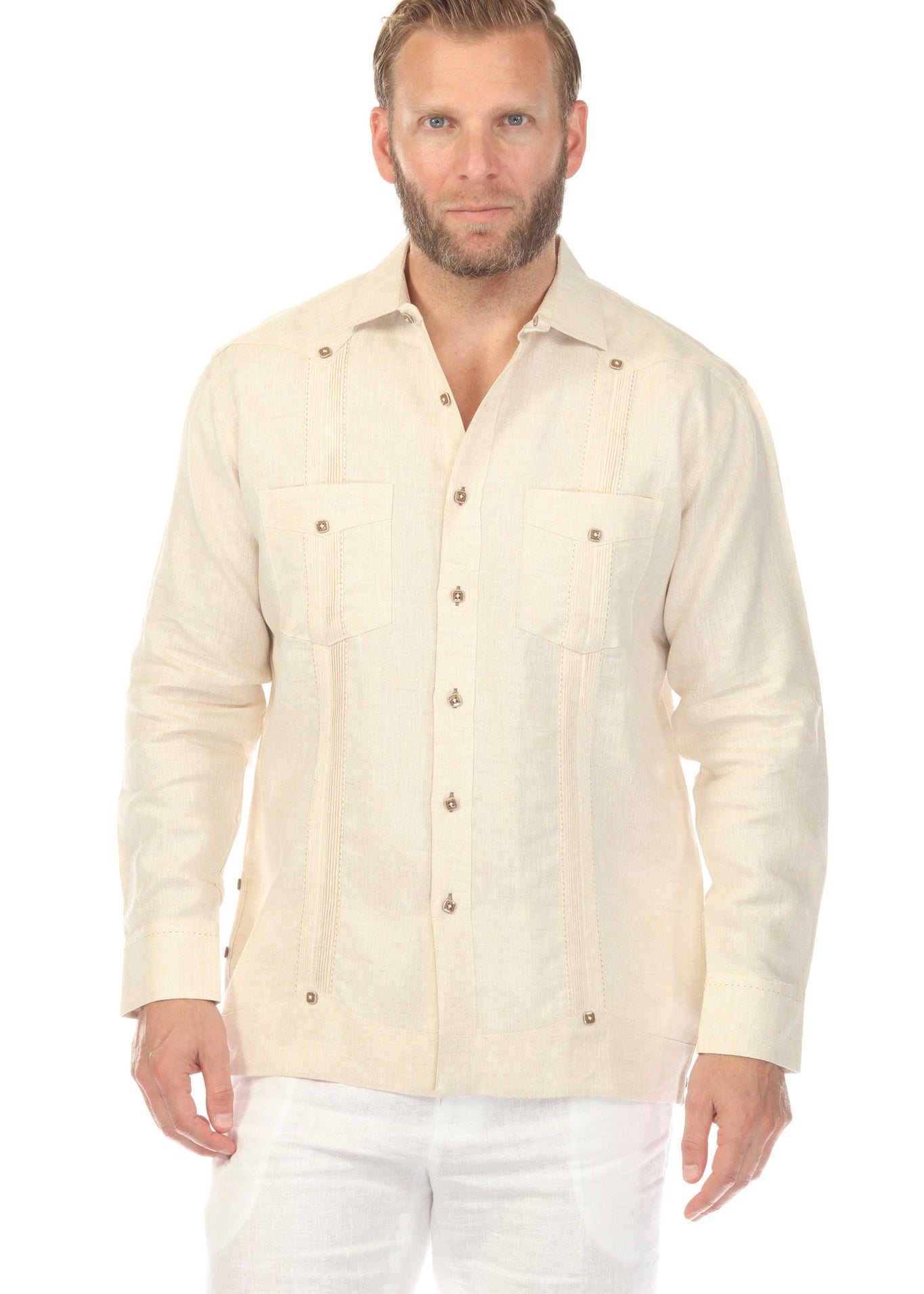 Front view of a man wearing a cream-colored Men's 100% Linen Two Pocket Fancy Guayabera shirt.