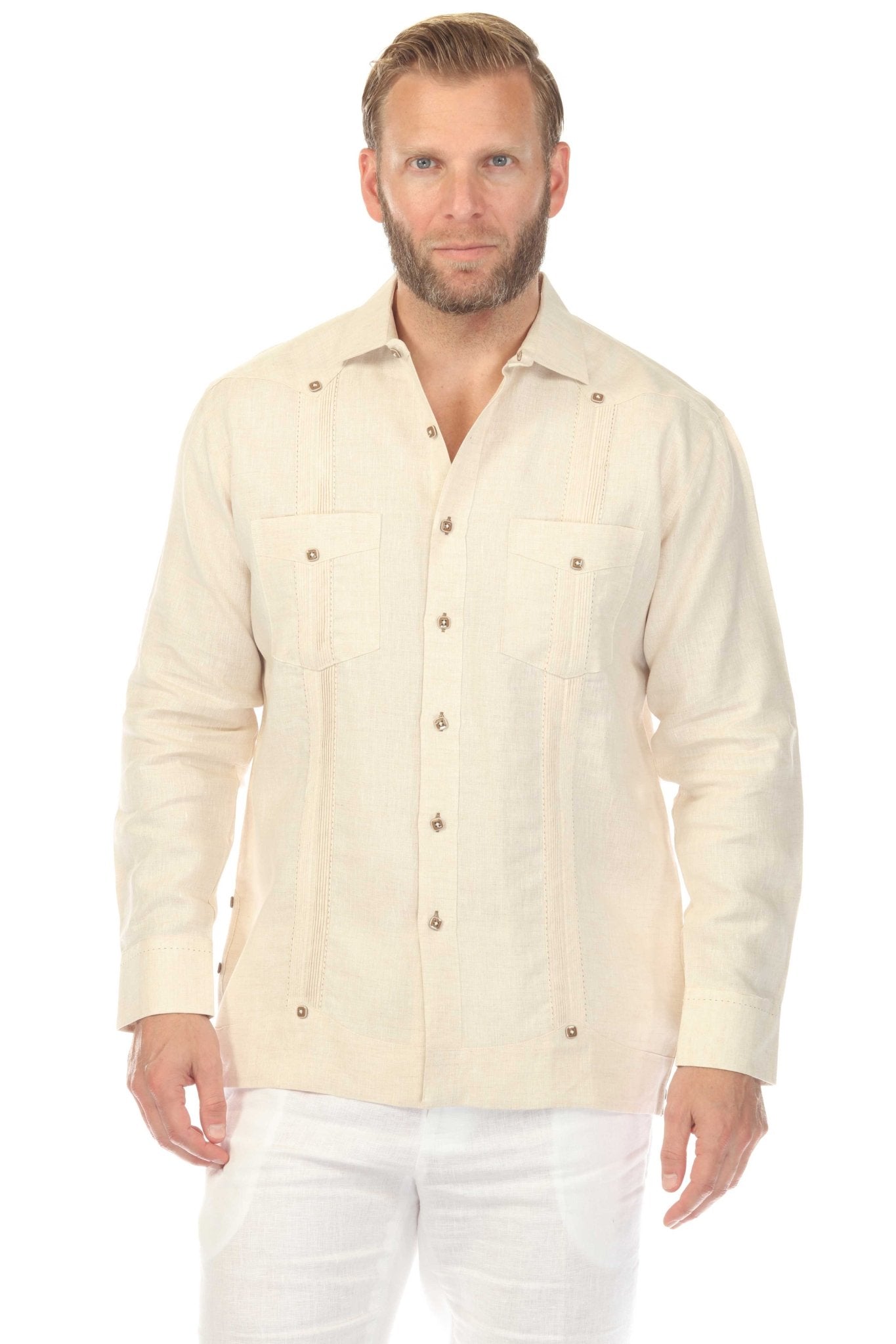 Front view of a man modeling the 100% Linen Contrast Panel Guayabera Shirt Long Sleeve in off-white with chest pockets.
