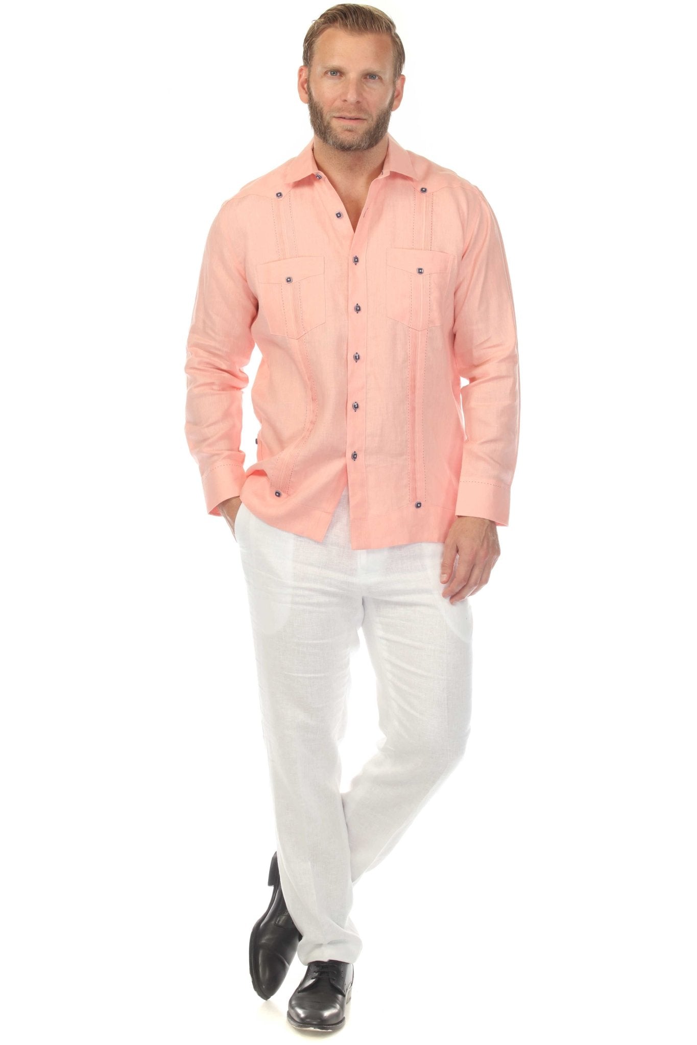 Front view of a man wearing the pink 100% Linen Contrast Panel Guayabera Shirt Long Sleeve with white pants.