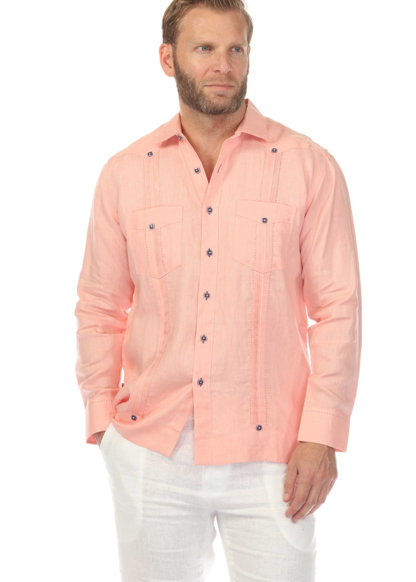 Man wearing a pink Men's 100% Linen Two Pocket Fancy Guayabera, shown from the front with two visible pockets.