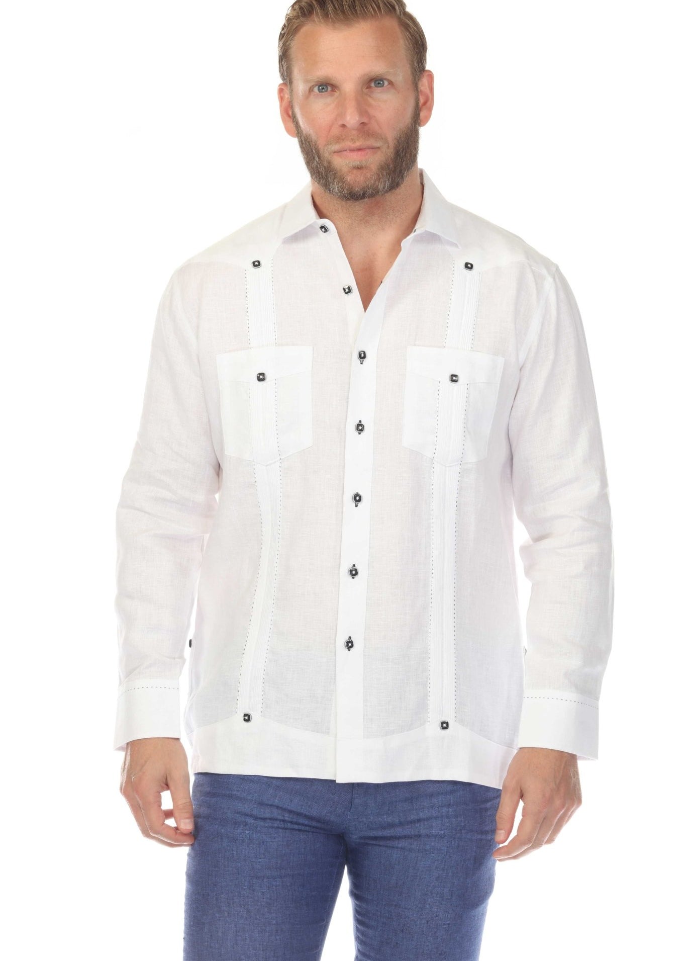 Front view of a man wearing a white 100% Linen Two Pocket Fancy Guayabera.