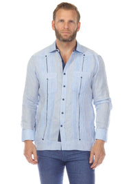 Front view of a man wearing a light blue 100% Linen Contrast Panel Guayabera Shirt Long Sleeve with dark blue contrast details.