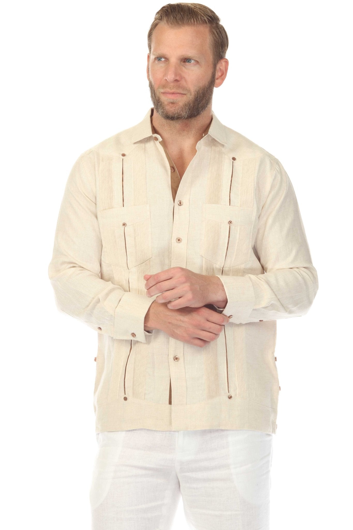 Front view of a man wearing the 100% Linen Contrast Panel Guayabera Shirt, long sleeve, in a light beige color with brown accents.
