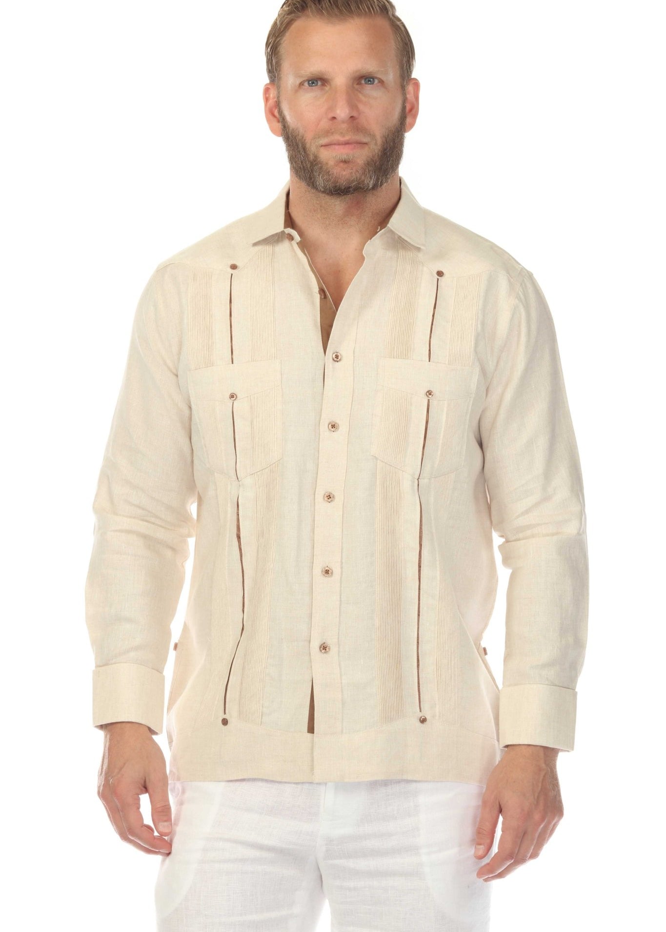 Front view of a man wearing the cream colored "Men's 100% Linen Two Pocket Guayabera" with contrast taping.