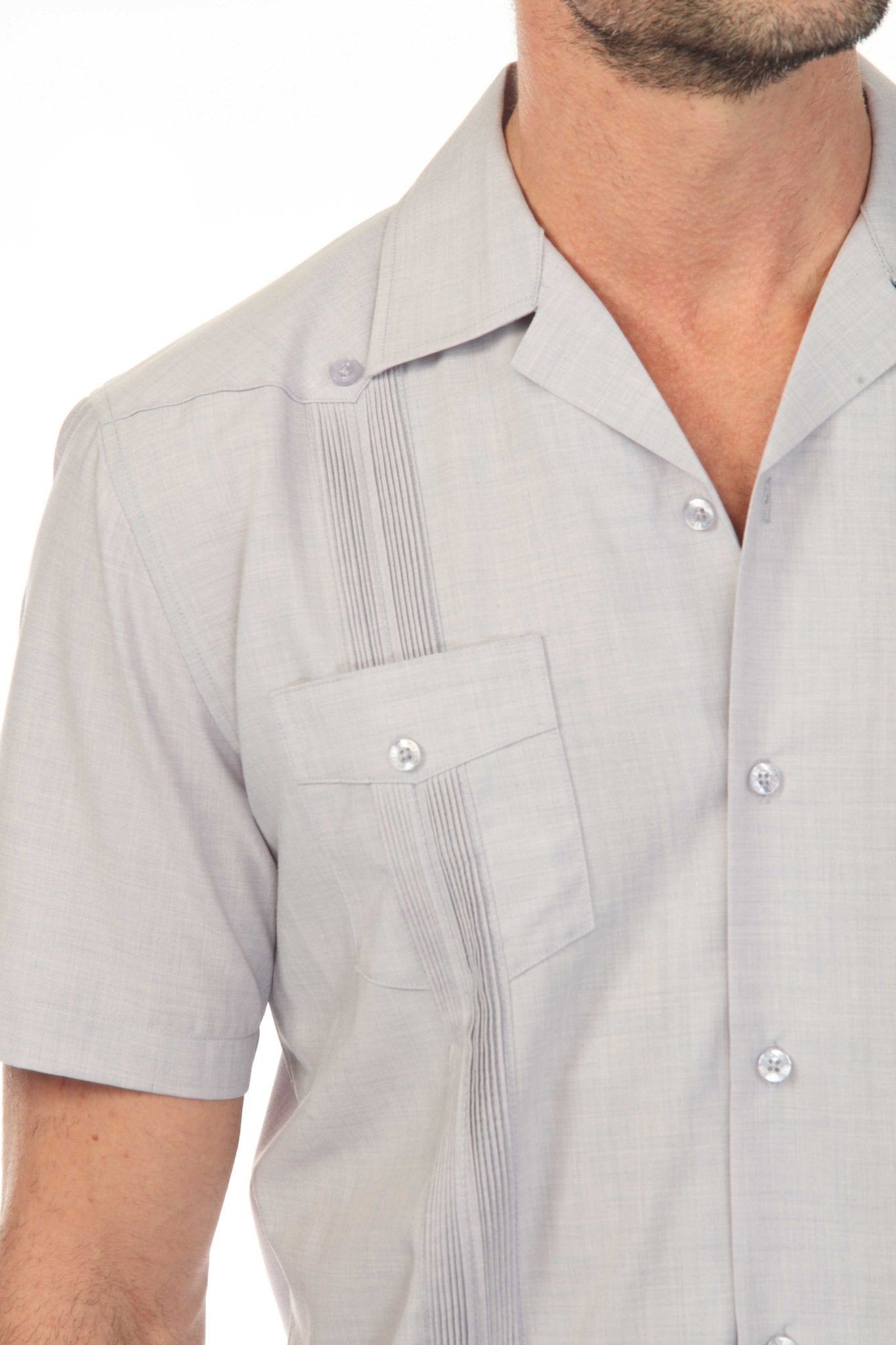 Close shot of a light gray Men's Two-Pocket Cross-Dye Guayamisa Shirt with Pleats.