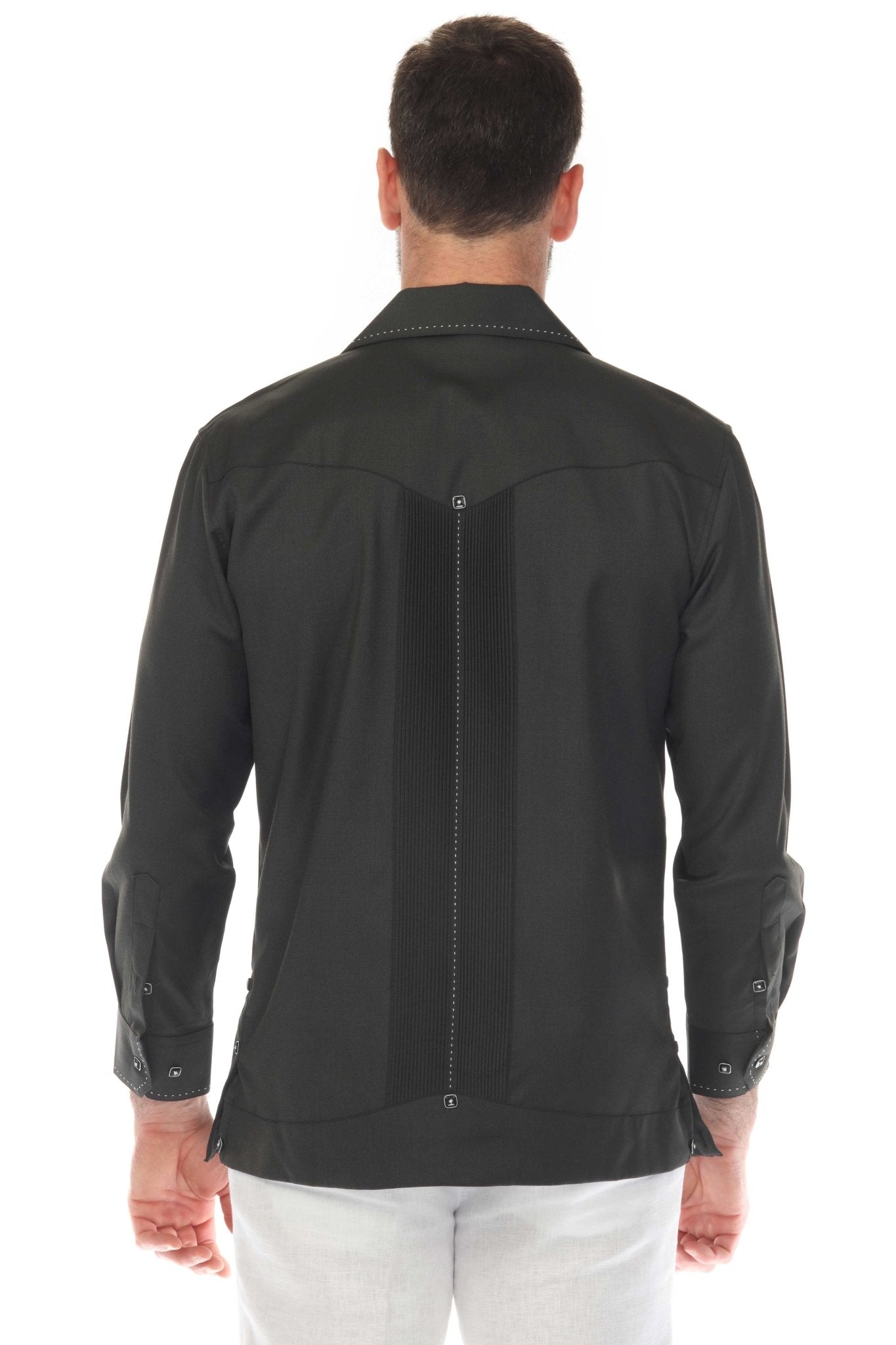 Back view of a man wearing a black long sleeve Guayabera shirt, showing pick stitching detail.
