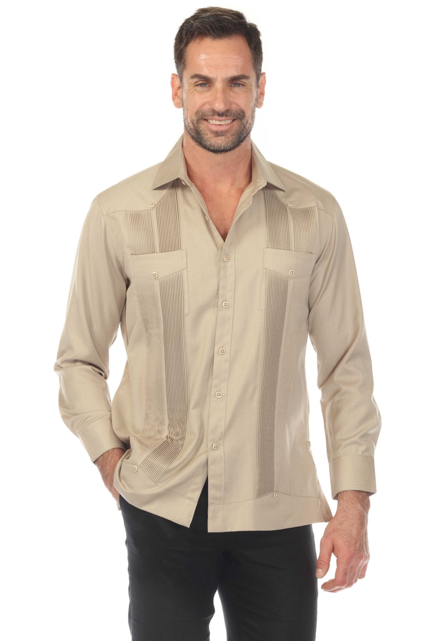 Front view of a man wearing a tan Men’s Long Sleeve Two-Pocket Guayabera Shirt with Pick Stitching.