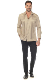 A man wearing a light brown Men’s Long Sleeve Two-Pocket Guayabera Shirt with Pick Stitching, shown in full view.