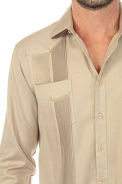 Close-up of a beige Men’s Long Sleeve Two-Pocket Guayabera Shirt with pick stitching detail and open collar.