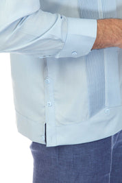 Close-up of the light blue Men’s Long Sleeve Guayabera Shirt showing the pick stitching and pleated two-pocket design.