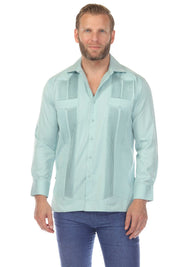Front view of a man wearing a light blue Men’s Long Sleeve Two-Pocket Guayabera Shirt with pick stitching detail.