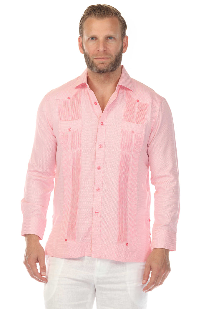 Man wears a Mojito Reserve Men's Two-Pocket Guayabera, shown in light green with diamond texture and two chest pockets.