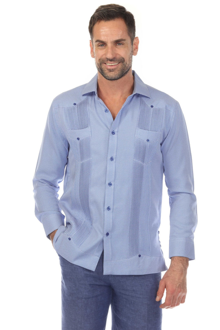 Man wears a Mojito Reserve Men's Two-Pocket Guayabera, shown in light green with diamond texture and two chest pockets.