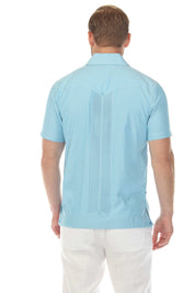 Back view of a man wearing a blue and white striped Men’s Two-Pocket Guayabera Shirt with Micro Textured Print.