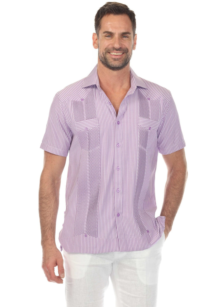 Front view of a smiling model wearing a pink striped Men’s Two-Pocket Guayabera Shirt with Micro Textured Print.